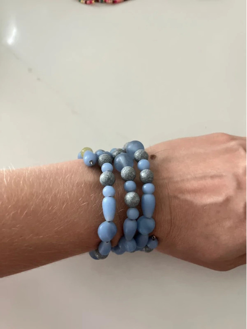Blue beads long bracelet rolled multi size beads